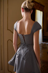 french grey fitted mini dress with voluminous skirt