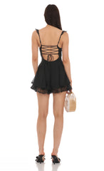 Dotted Sweetheart Neck Romper in Black