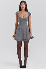 french grey fitted mini dress with voluminous skirt
