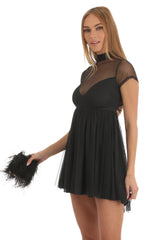 Sheer Mock Neck Baby Doll Dress in Black
